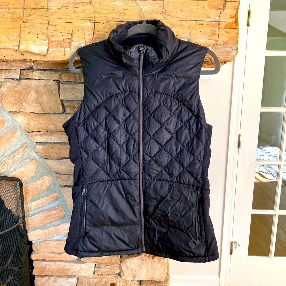 Lulu Lemon women’s black front zip black vest. Size 12.